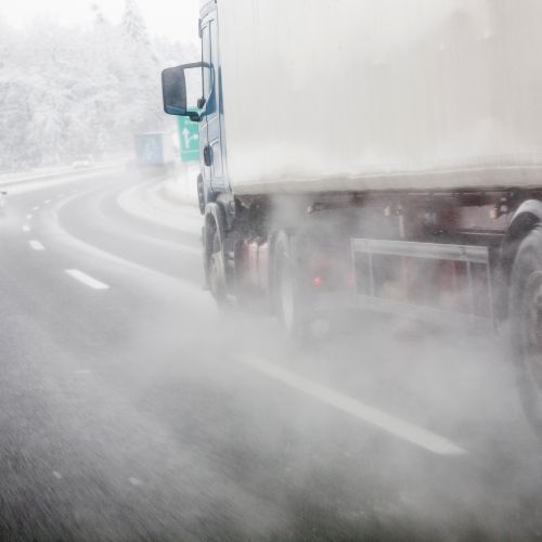 truck driving in wet conditions