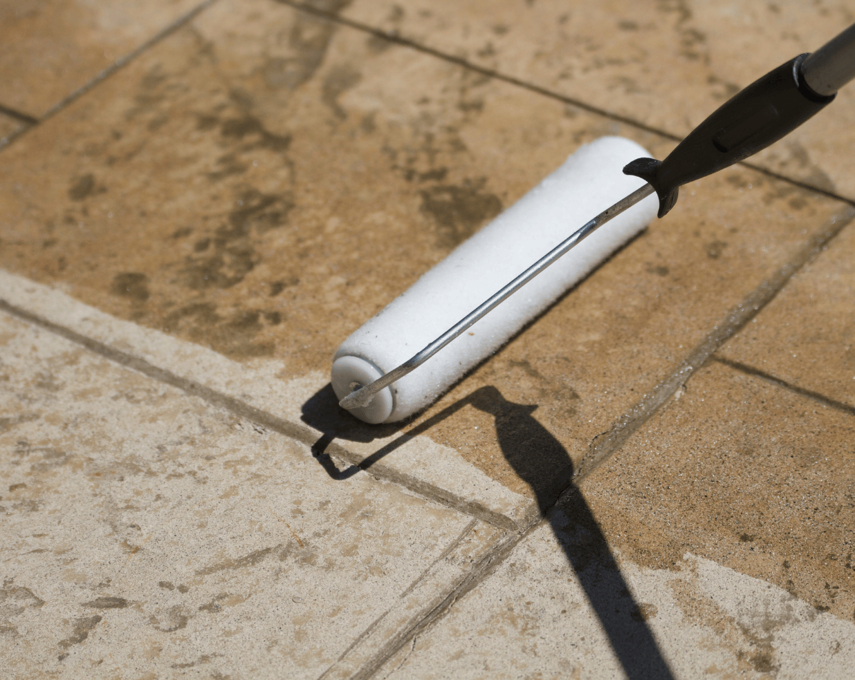 applying a sealant to a natural stone surface